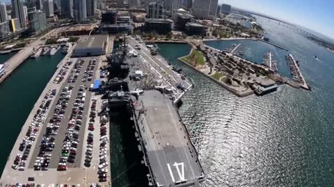 AMAZING VIDEO of Army Soldier parachuting onto the USS Midway