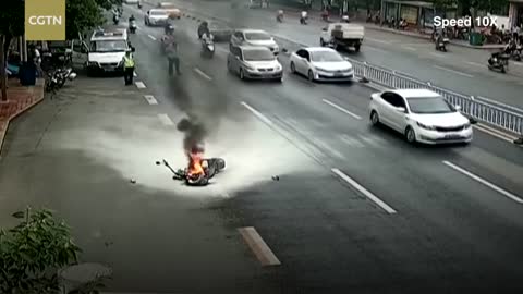 Electric car catches fire, burns passenger