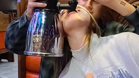 Girl Attempting to Chug Drink Tower Forgets to Swallow