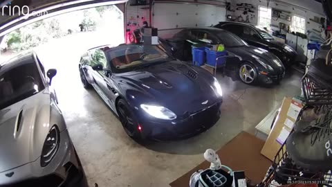 Masked criminals stole an Aston Martin from its owner in Westport, Connecticut, as he entered garage