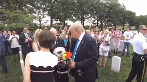 Young Man showing President Trump his father's grave