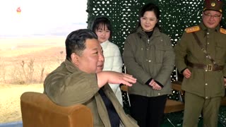 Photos of Kim overseeing North Korean ICBM launch with daughter in tow