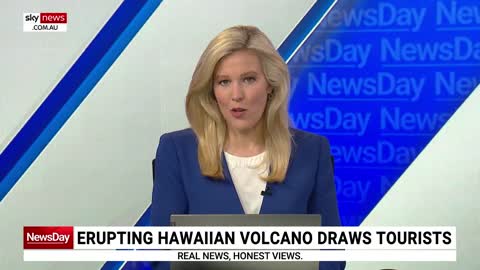 Tourists flock to see Hawaii's erupting volcano Mauna Loa