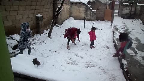 children enjoy the snow