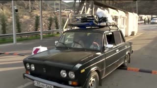 People fleeing Nagorno-Karabakh cross into Armenia