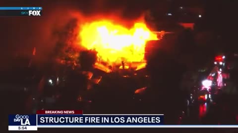 Major fire on Cumpston and Camellia in North Hollywood. Wind blowing embers to other structures