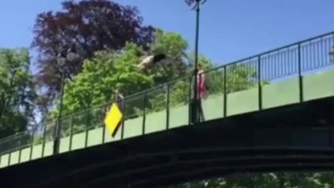 Guy Flops Into A River Doing A Backflip Off A Bridge