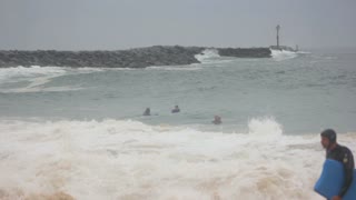 Bodyboarder gets swept off feet by surf