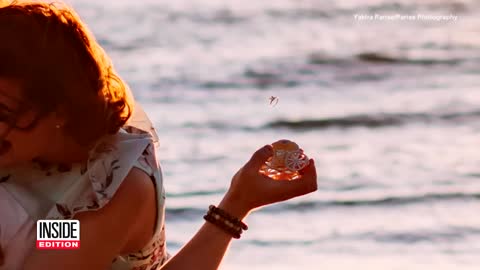 See the Moment Couple Lost Engagement Ring on Beach