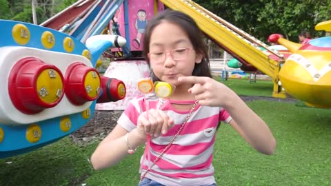 kid and Sister pretend play with Fruit Lollipops