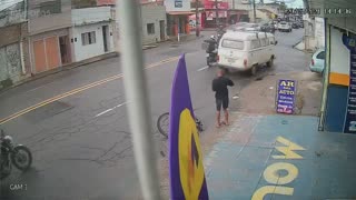 Cyclist's Shoulder Clipped by Passing Van