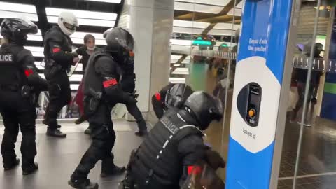 Paris police beat woman at a mall. She didn't have a vaccine passport.