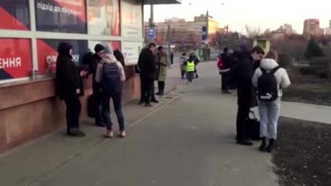 Ukrainians shelter in subway, expecting air strikes