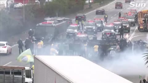 Brazilian police fire water cannons and rubber bullets at anti Lula protesters