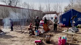 China's quake survivors fear aftershocks, cold weather