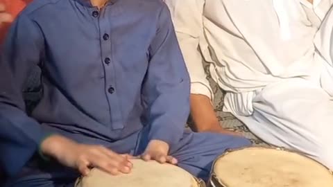 A little kid performance on tabla