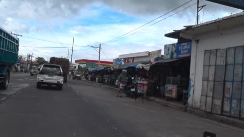 MIKO TURNING INTO TRAFFIC AT INTERSECTION, PILI PHILIPPINES