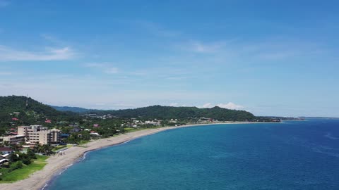 Mellow Day On The Beach - San Juan La Union Philippines - San Fernando City on the Horizon