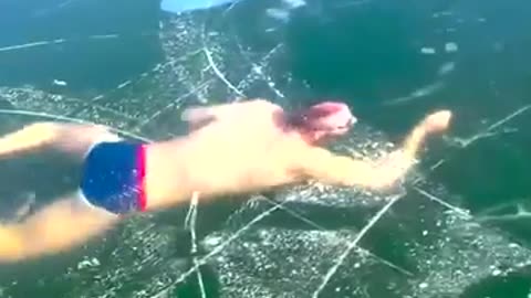 Men gets stuck swimming under the ice. MUST WATCH THIS VIDEO!!!!