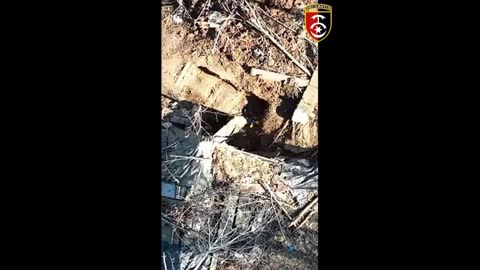 Moment Ukrainian Drone Drops Bombs On Russian Ammo Stashes Hidden In Dugouts And Foxholes