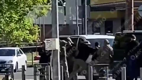 Civilian man in Odessa being abducted by Ukrainian TCC army recruiters