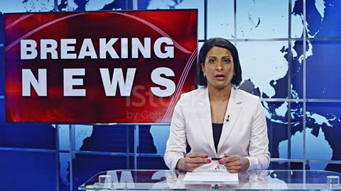 Indian female anchor presenting breaking news on floods stock video