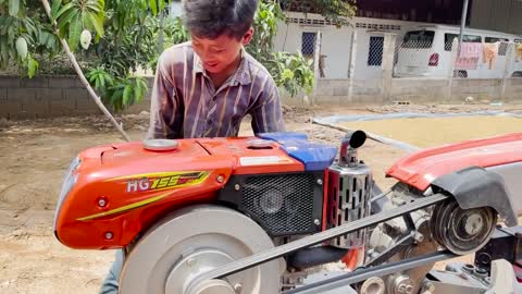 #79-driver tractor go transport water at the river