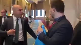 In Turkey, a Russian delegate tore the flag of Ukraine out of the hands of MP