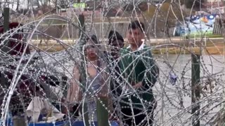 Venezuelan Illegals are blocked from entering illegally by razor wire installed by Texas Military