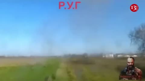 Ukrainian fighters have a narrow escape after their armored vehicle is hit by a mine during attack