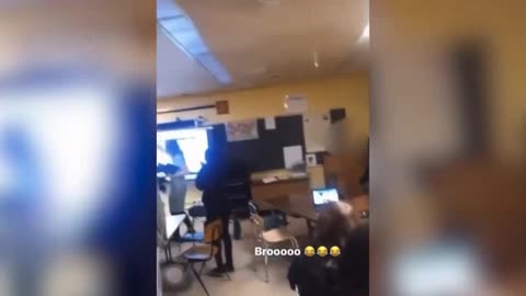 BLACK FEMALE KNOCKS WHITE TEACHER OUT WITH METAL CHAIR