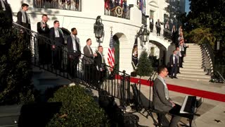 "Gay Men's Chorus" of Washington, DC sings a song at ceremony about same sex marriage held at WH South Lawn: "How justice was denied, make them hear you..."