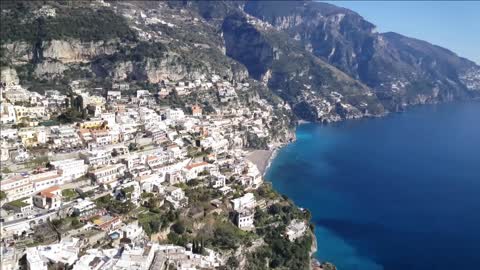 pan from the coastal town spiaggia del fornillo in italy