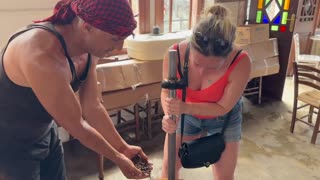 Crushing up Turkish coffee by hand in Cunda, Turkey