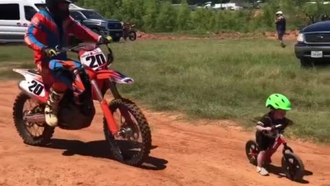 2 Year Old Strider BMX kid vs Dirt Bike! #shorts #bmx #strider #motocross