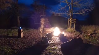 Night lapse of a vlog by campfire. Wildcamping