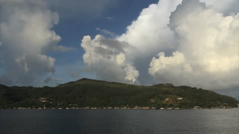 A cloud over a tropcial island