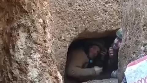 "A Russian shell lands in a Ukrainian trench in Zaporizhzhia."