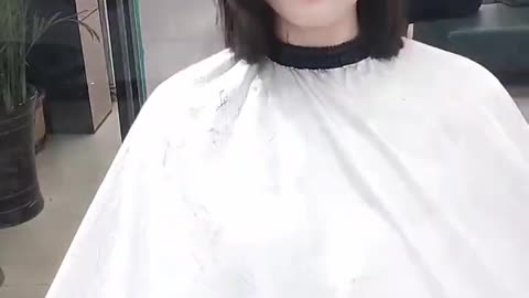 beautiful girl hair cut in salon