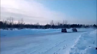 Two Drifting Cars Slide into Snow and Overturn