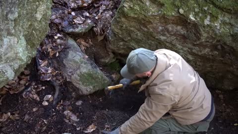 Four excavated shelter.Building underground bunker.Earth hut. primitive technology.