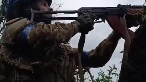 Ukrainian soldier in a skirmish with Russian forces near the village Kurdyumivka