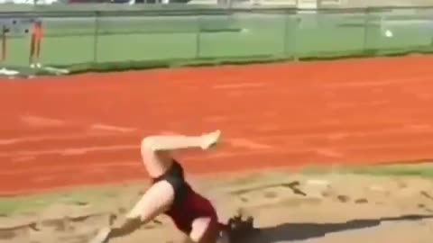 Girl doing long jump gone wrong