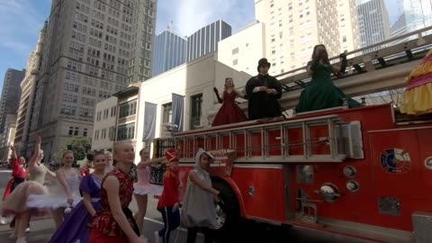 Girl Twirl Baton While Walk With Parade