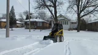 CLEAN SNOW WITH MINI SKID LOADER