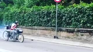 Small motorcycle misses turn and runs into fence gate