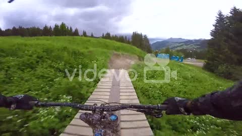 Pov From The Front Of A Bmx Dirt Bike Biking On A Muddy Outdoor Course In Les Gets France 1