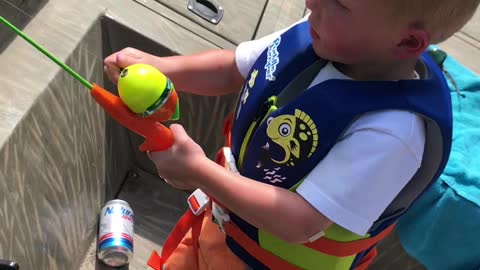 3-year-old Tosses Rod After Catching His First Fish