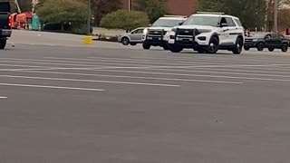 Truck Drives Circles Around Police in Parking Lot
