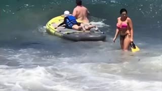 Big Board Slams Whole Family in Surf